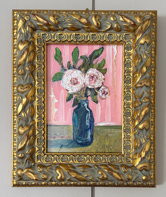 Flowers in Antique Blue Glass Bottle